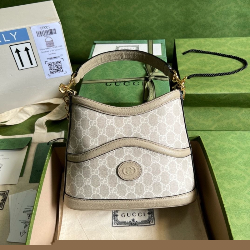 G*u*i top handle bags